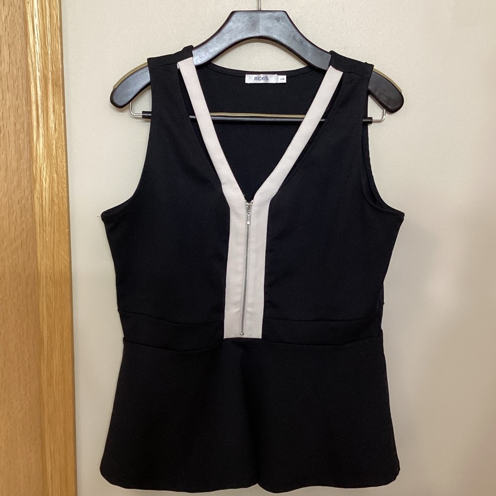 Black and White Sleeveless Peplum Style Top